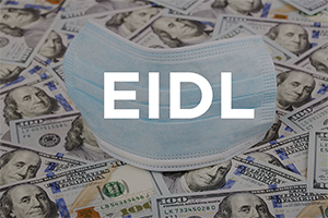 image of mask and dollar bills with text EIDL