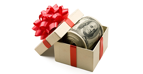 Roll of money in gift box with red bow