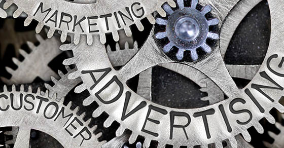 picture of the words advertising, marketing, and customer on gears