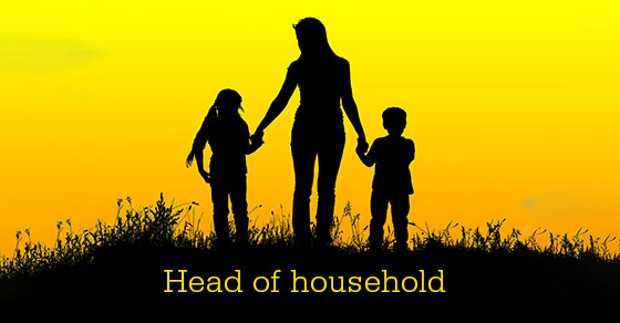 silhouette of a woman and two kids
