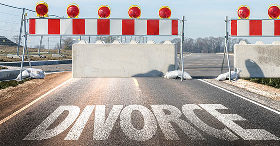 picture of the word divorce on a road with a road block