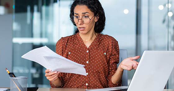 business woman looking at paperwork