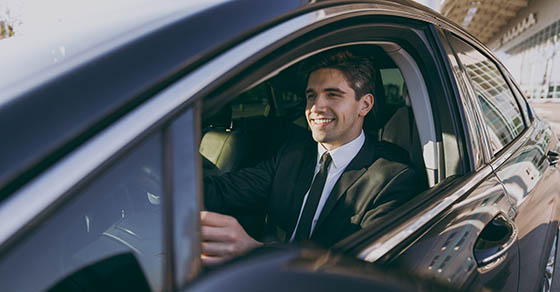 man in car