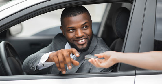 man in company car