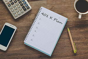 image of notebook with text 401k plan