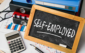 image of chalkboard with text self employment