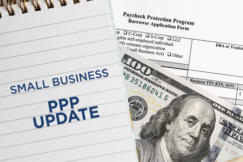 image of ppp loan application with notepad and text: small business ppp update