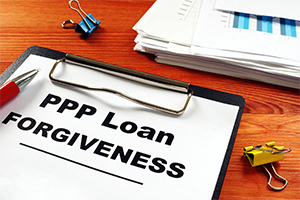 image of clipboard with text ppp loan forgiveness