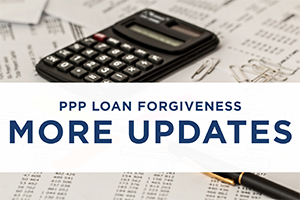 image of tax papers with text PPP loan forgiveness more updates