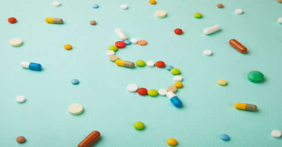 image of pills in shape of dollar sign