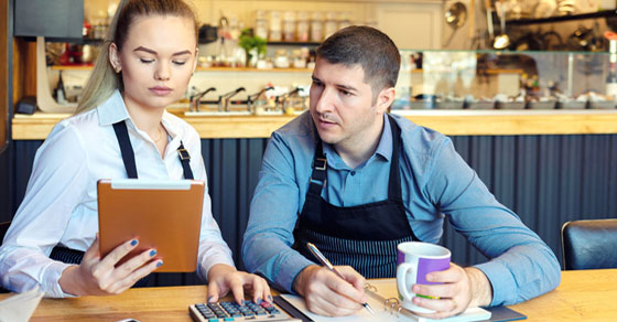 image of man and woman working at restaurant