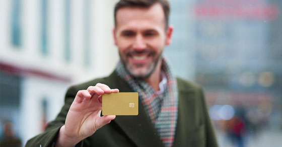 man holding credit card