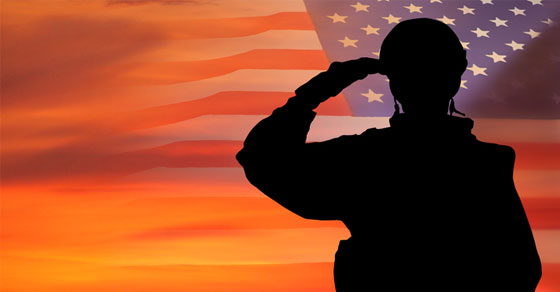 soldier saluting to American flag