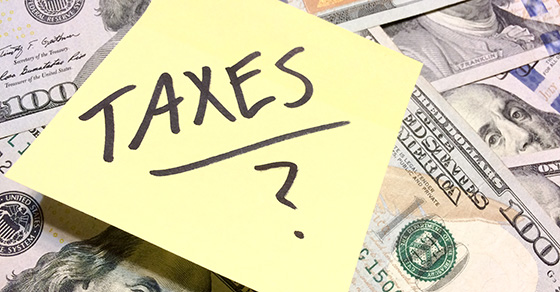 image of post it note with text: taxes?